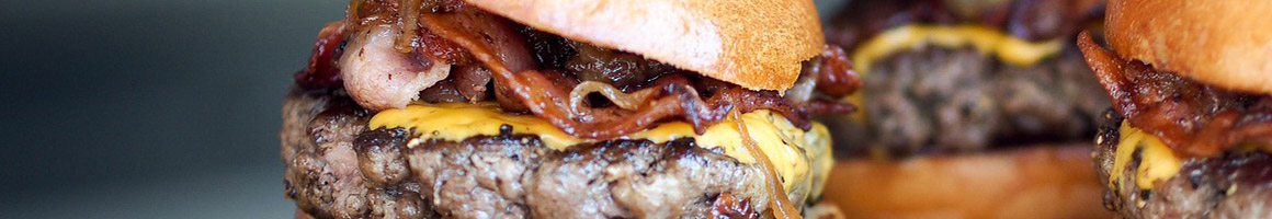 Eating Burger Fast Food Greek at Olympus Burgers restaurant in Sandy, UT.